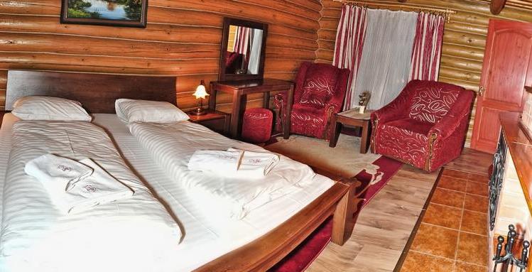 фото спальни коттеджа в Сваляве